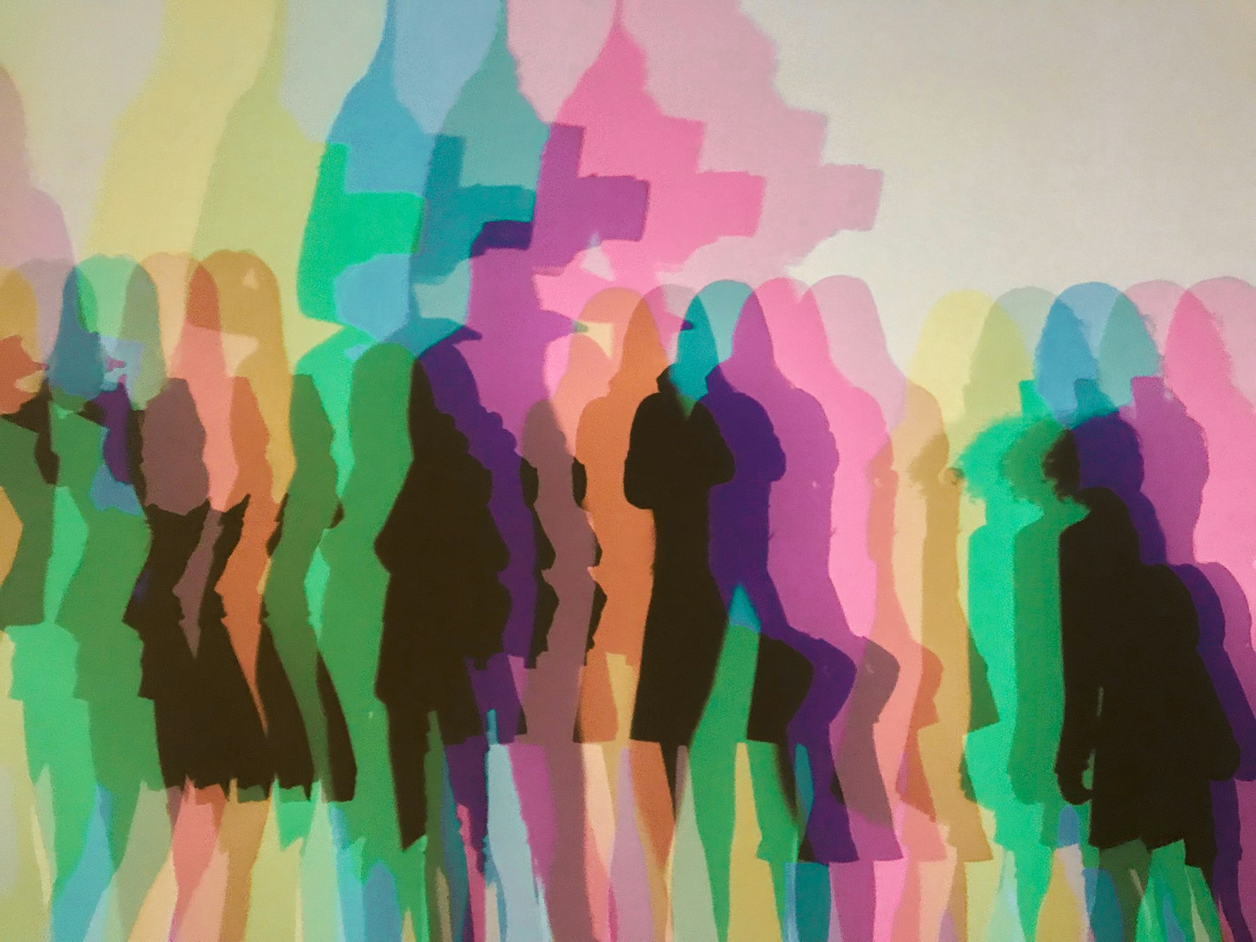 a group of people standing next to each other